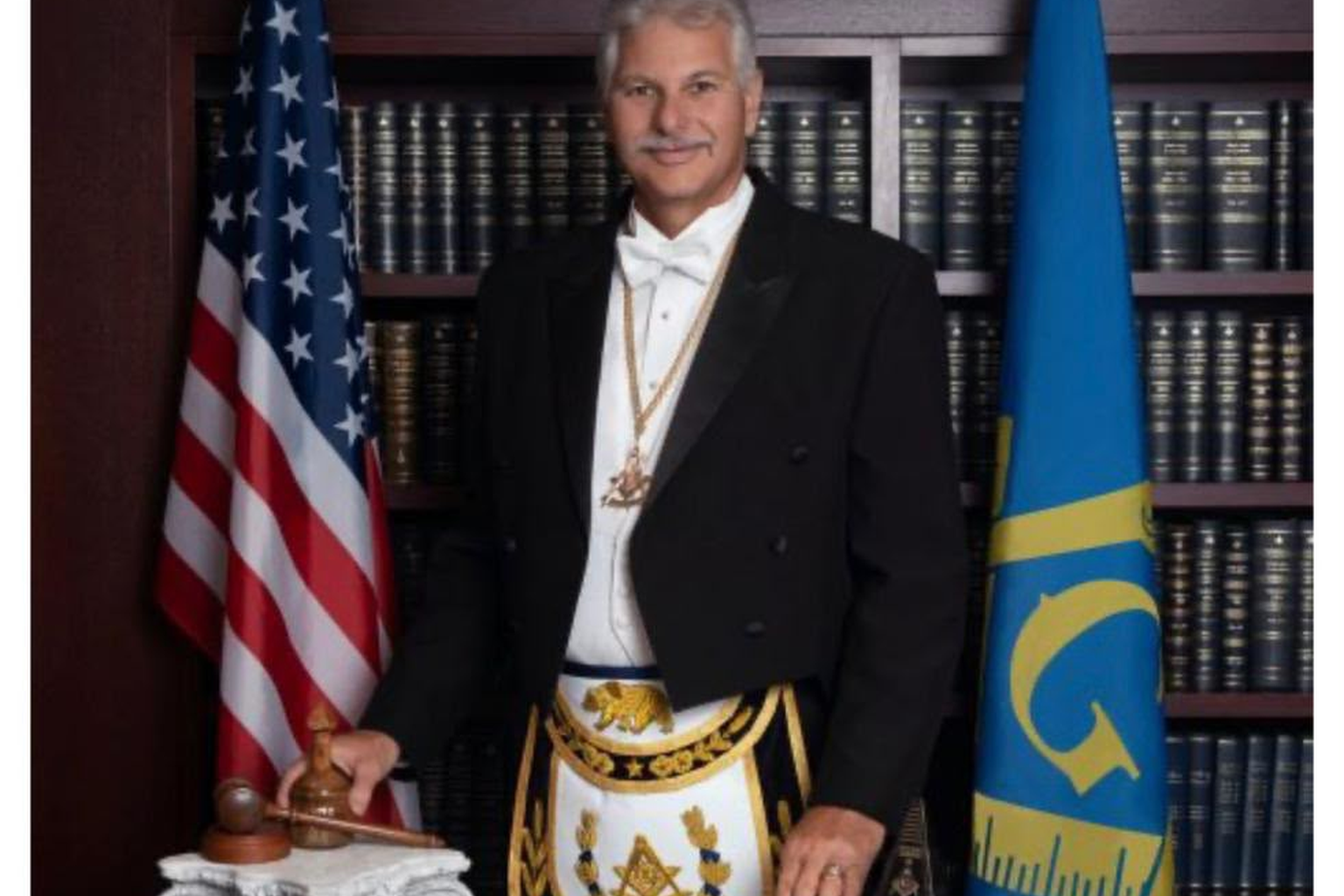 regenerate this Image and manatin the same dimensions and colors but try to add the word: Africa Grand Lodge on the Front Cloth